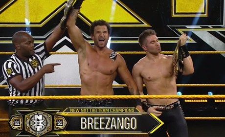 放荡哥与布里斯终于迎来WWE职业生涯中的首条冠军！